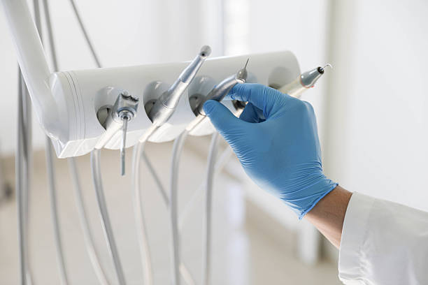 Professional Tooth Extraction technician working in Laguna Woods, CA